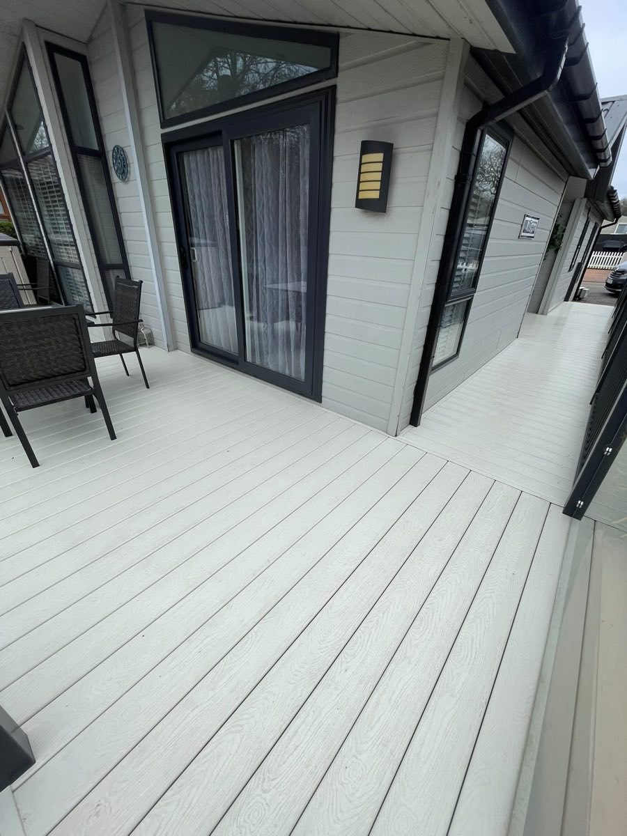 Composite decking and a house frontage after cleaning