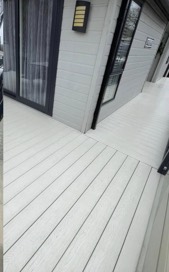 The same timber decking after cleaning, back to pale wood