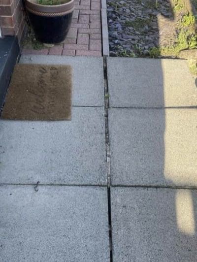 The same front path after cleaning, even grey slab